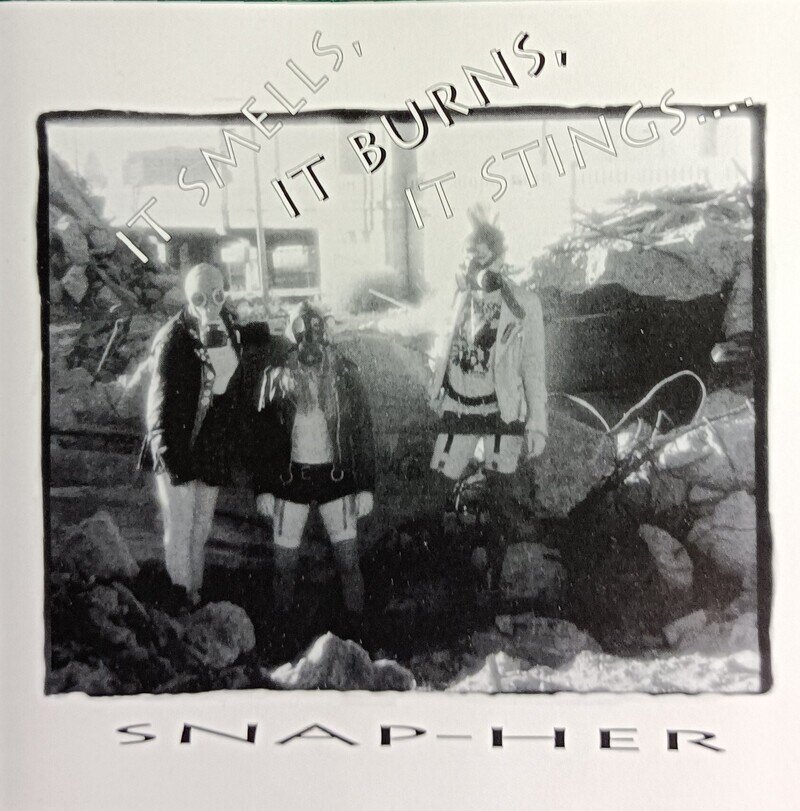 Snap Her『It Smells, It Burns, It Stings···』CD